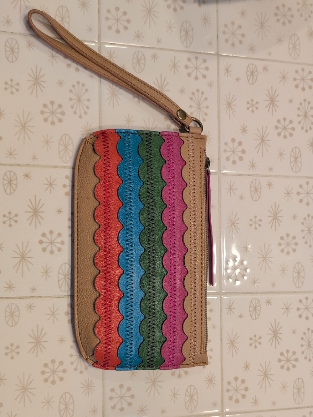 Relic Tan Wristlet with Rainbow Scalloped Stripe Detail